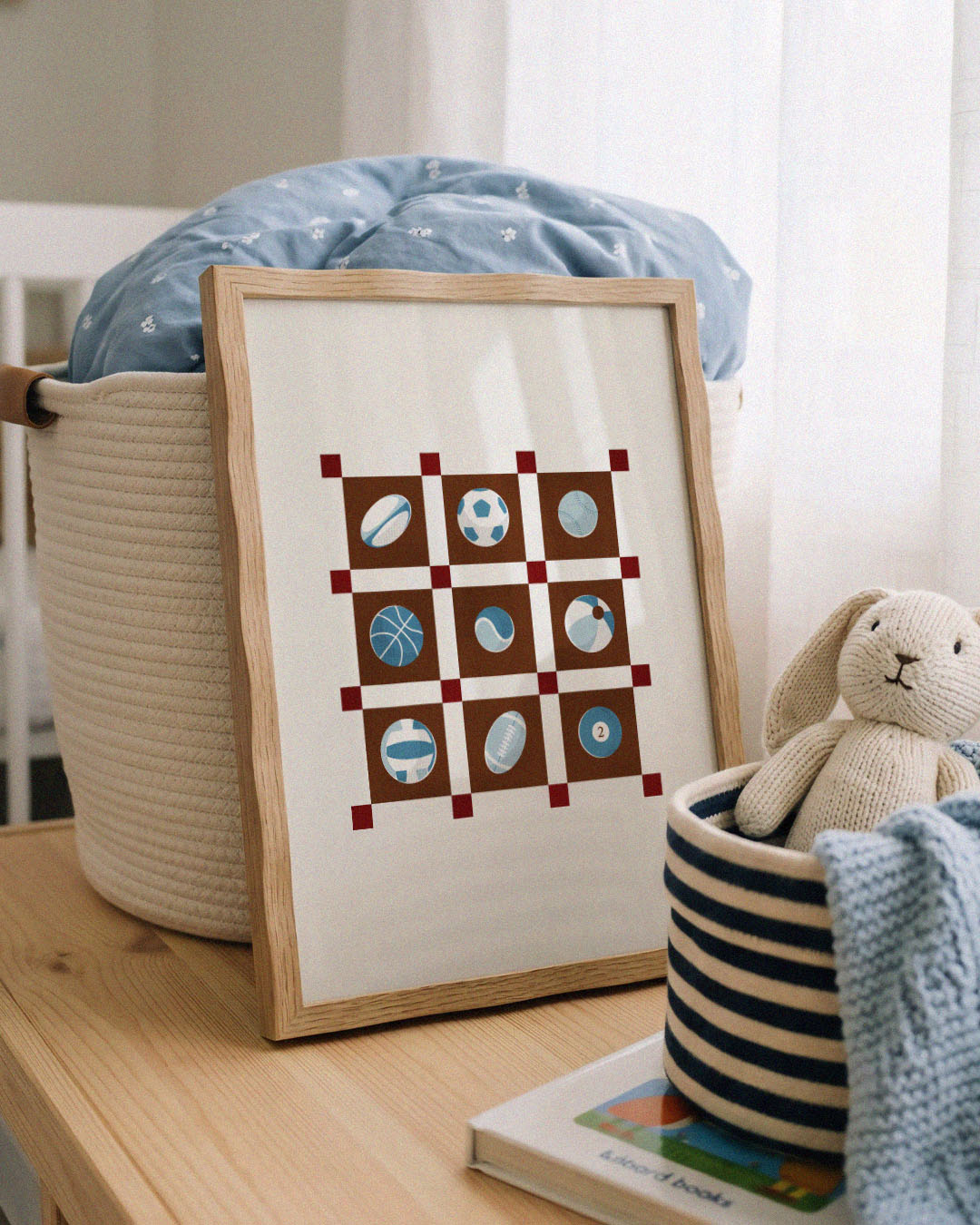 Kids sports wall art print with nine illustrated balls in a blue and brown patchwork grid